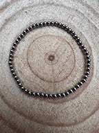 3mm Sterling Pearl Stretch Bracelet - Cowhide and Conchos