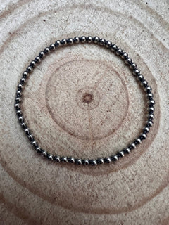 3mm Sterling Pearl Stretch Bracelet - Cowhide and Conchos