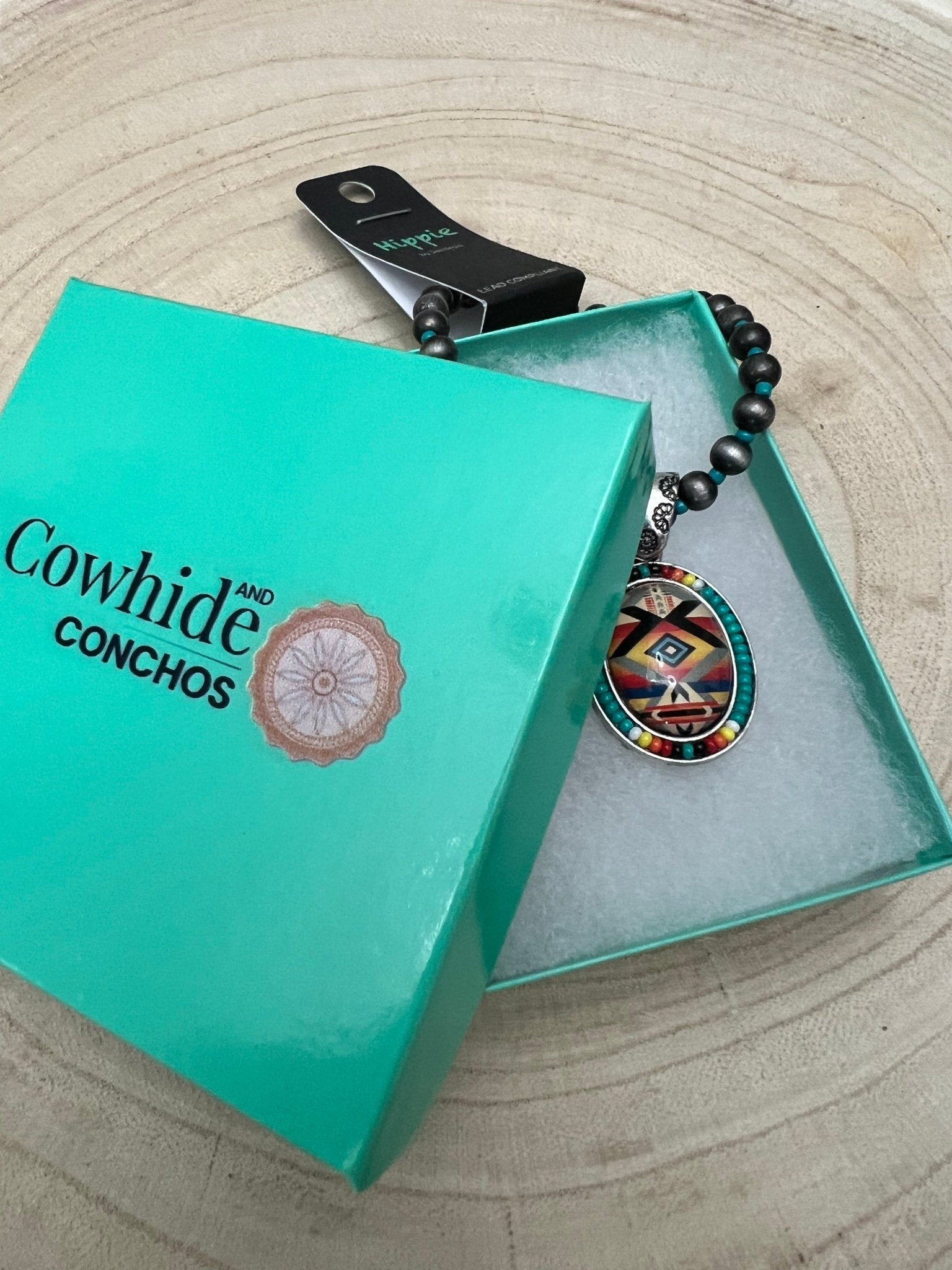Aztec Pendant with Seed Bead and Faux Pearl and Turquoise Stretch Bracelet - Cowhide and Conchos