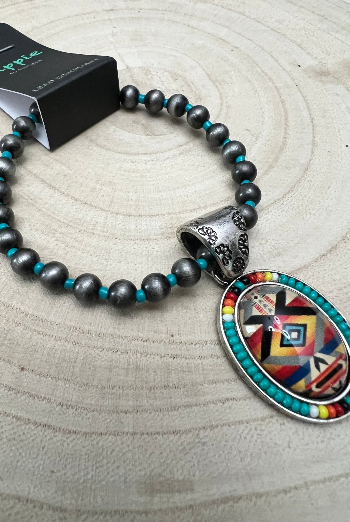 Aztec Pendant with Seed Bead and Faux Pearl and Turquoise Stretch Bracelet - Cowhide and Conchos
