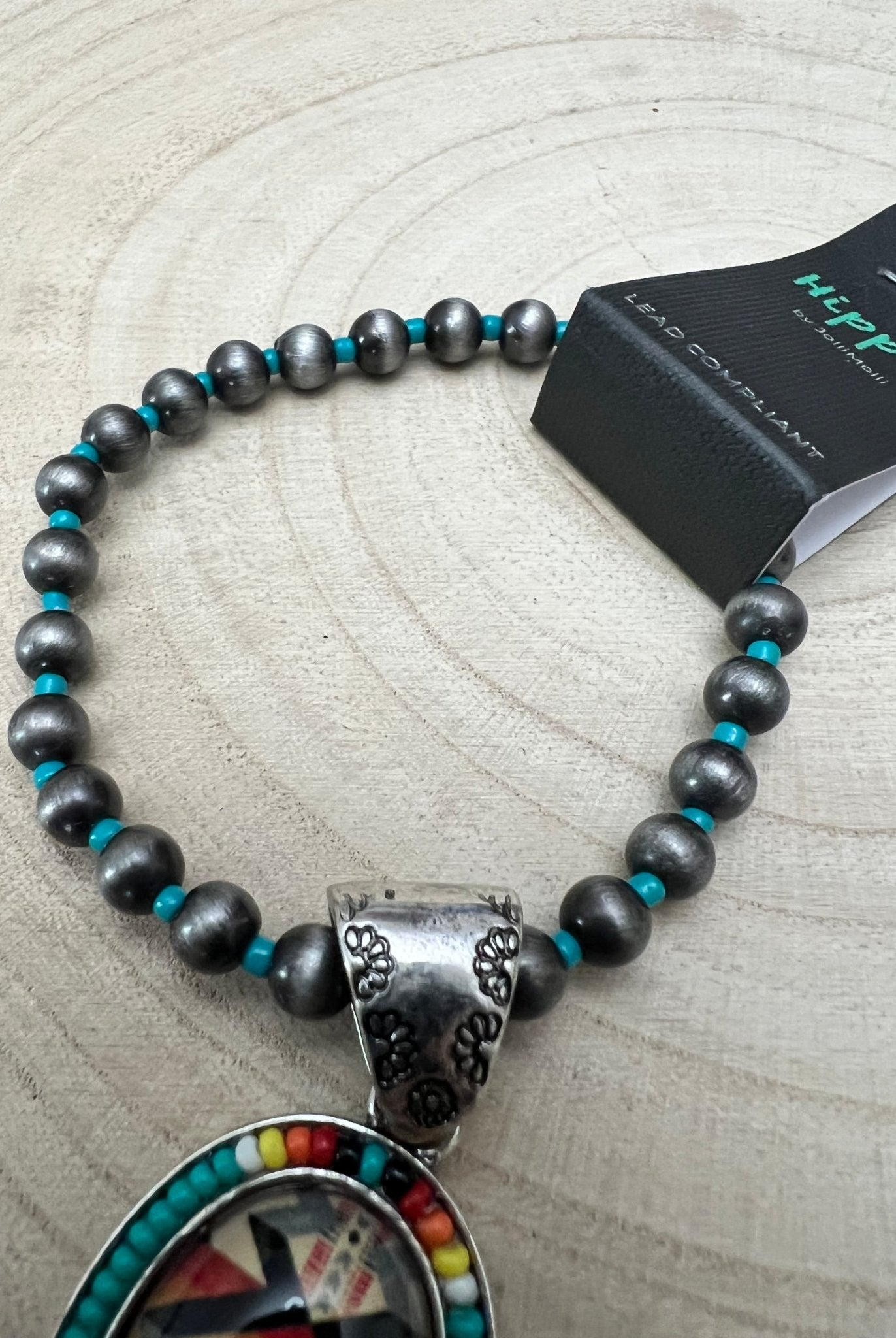 Aztec Pendant with Seed Bead and Faux Pearl and Turquoise Stretch Bracelet - Cowhide and Conchos