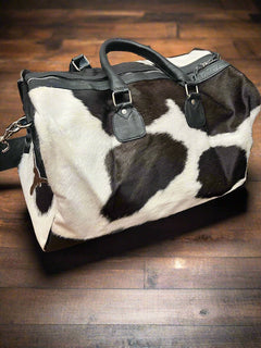 Black and White Longhorn Cowhide Duffle Bag - Cowhide and Conchos