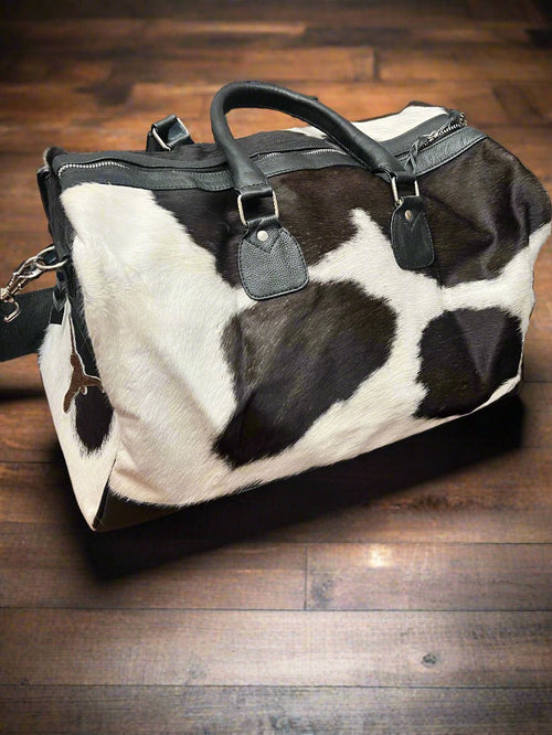 Black and White Longhorn Cowhide Duffle Bag - Cowhide and Conchos