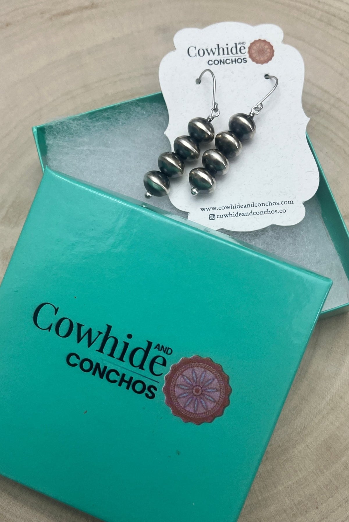 Bryannen Halwood Navajo Pearl Earrings — 2" Sterling Silver (Handcrafted by Navajo Artist) - Cowhide and Conchos