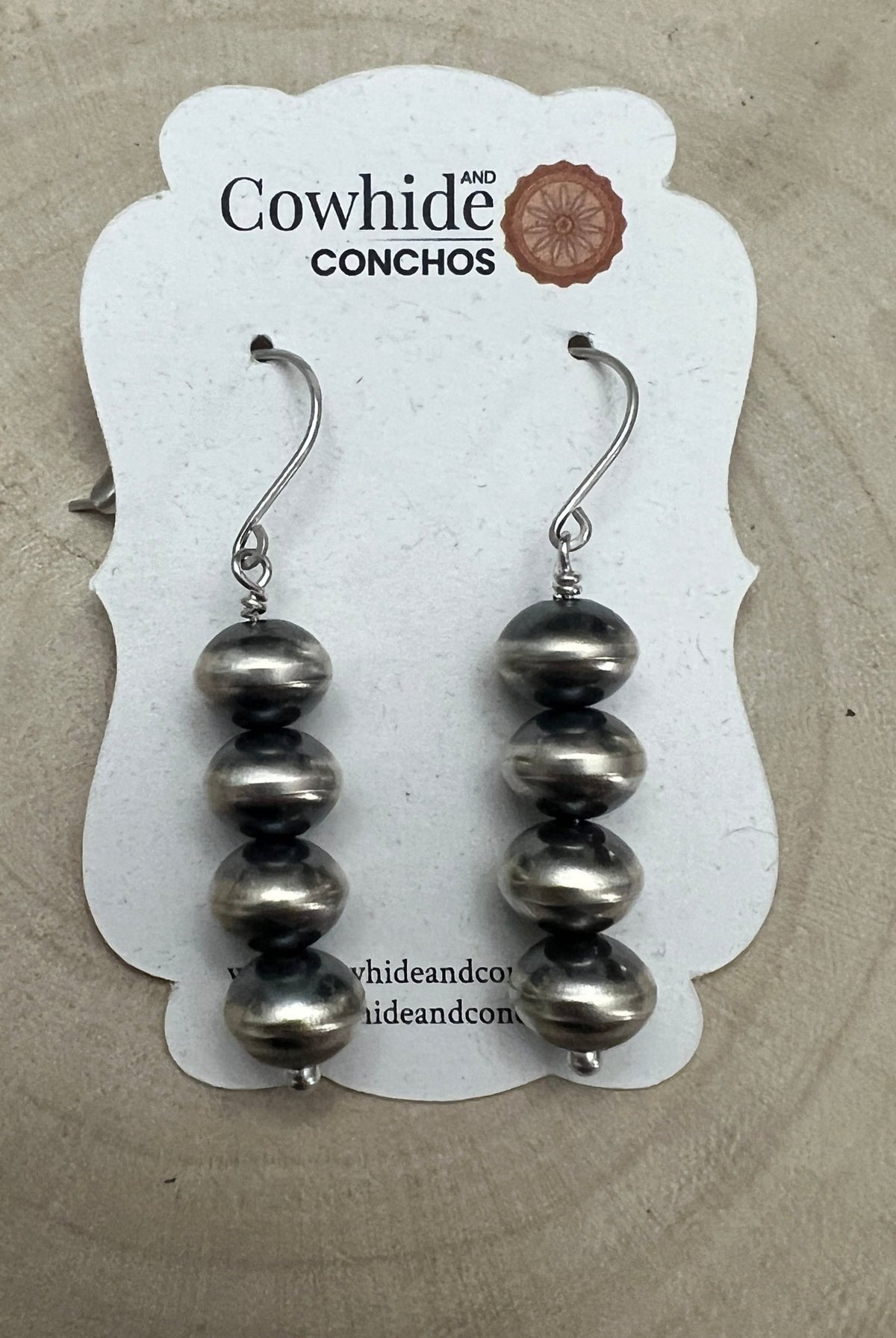 Bryannen Halwood Navajo Pearl Earrings — 2" Sterling Silver (Handcrafted by Navajo Artist) - Cowhide and Conchos