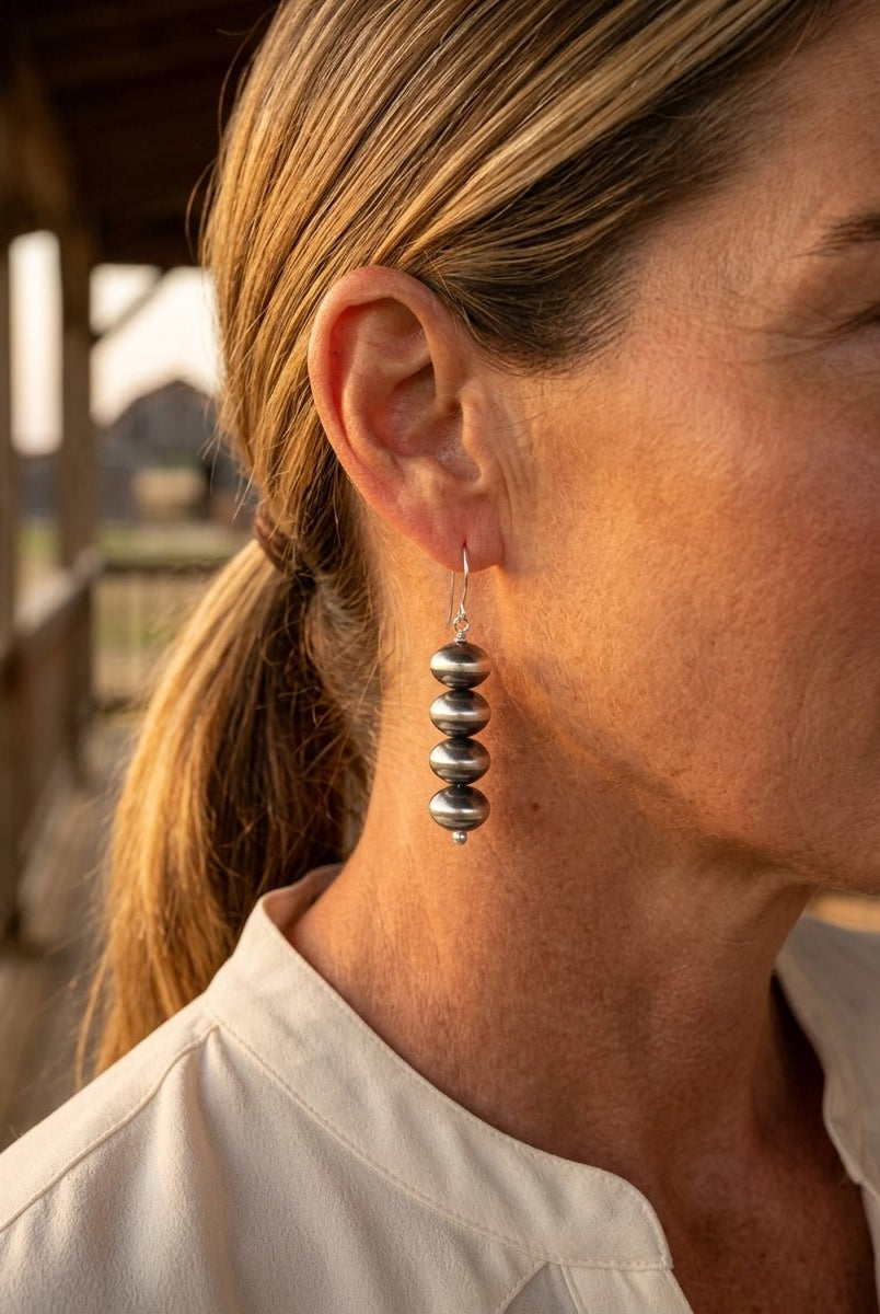 Bryannen Halwood Navajo Pearl Earrings — 2" Sterling Silver (Handcrafted by Navajo Artist) - Cowhide and Conchos