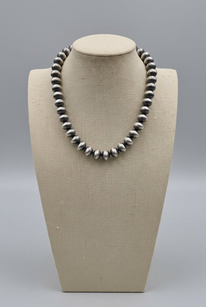 Bryannen Halwood Navajo Sterling Silver Handcrafted Navajo Pearl Necklace — 16" (10mm×13mm Beads, Heirloom) - Cowhide and Conchos