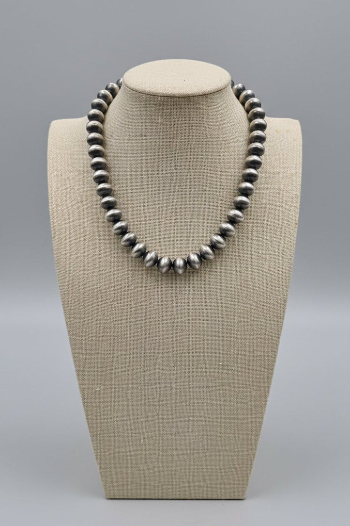 Bryannen Halwood Navajo Sterling Silver Handcrafted Navajo Pearl Necklace — 16" (10mm×13mm Beads, Heirloom) - Cowhide and Conchos
