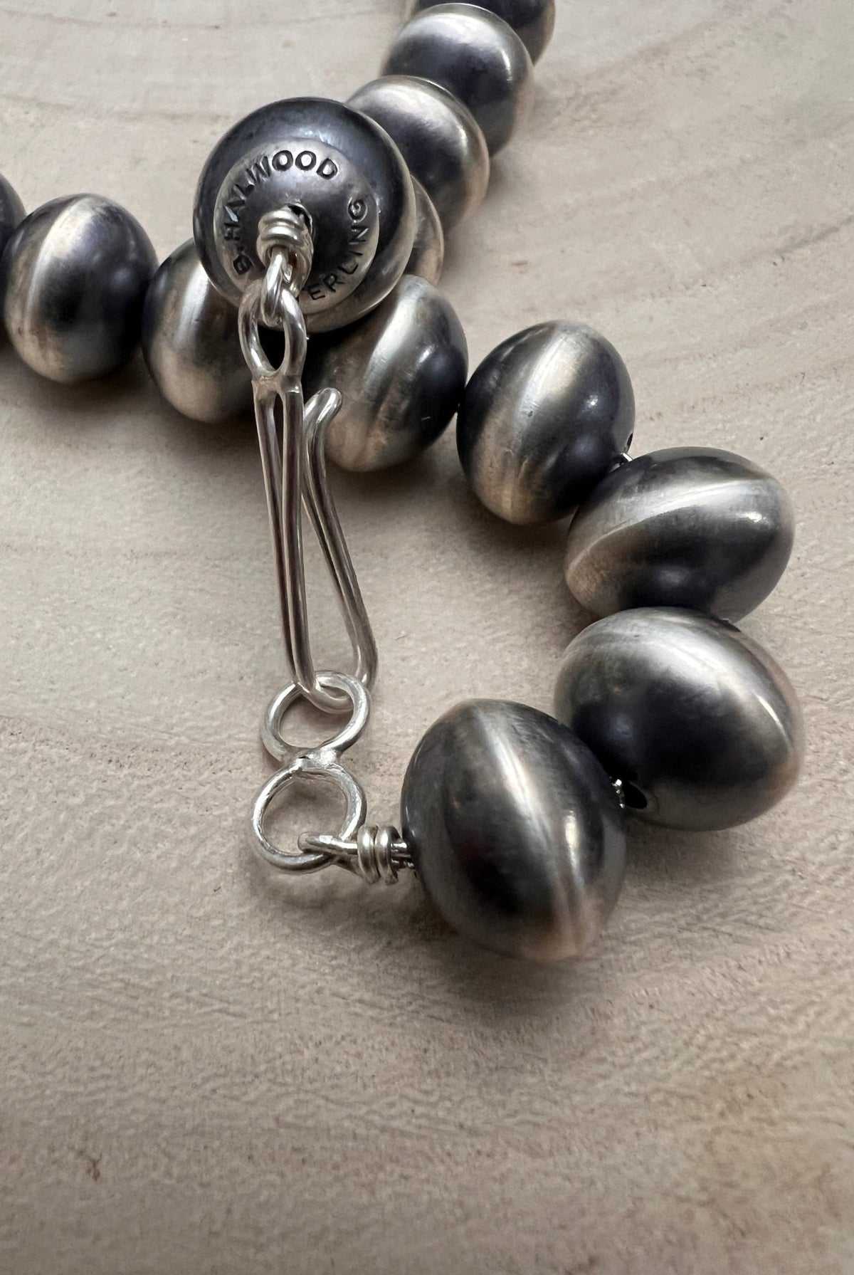 Bryannen Halwood Navajo Sterling Silver Handcrafted Navajo Pearl Necklace — 16" (10mm×13mm Beads, Heirloom) - Cowhide and Conchos