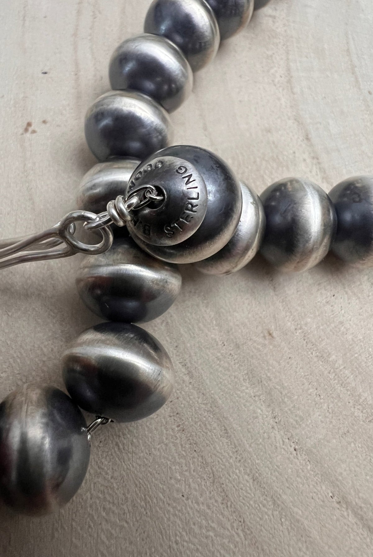 Bryannen Halwood Navajo Sterling Silver Handcrafted Navajo Pearl Necklace — 16" (10mm×13mm Beads, Heirloom) - Cowhide and Conchos
