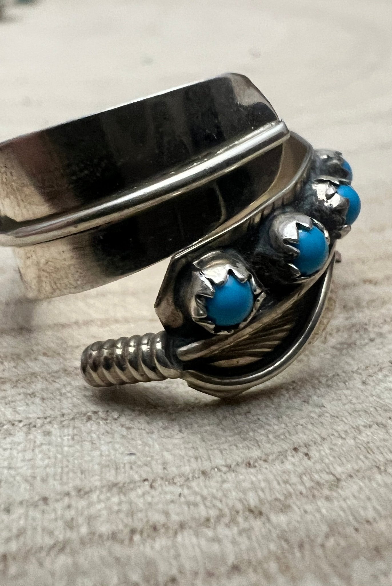 Chester Charley Navajo Handmade Kingman Turquoise Feather Adjustable Ring - Cowhide and Conchos
