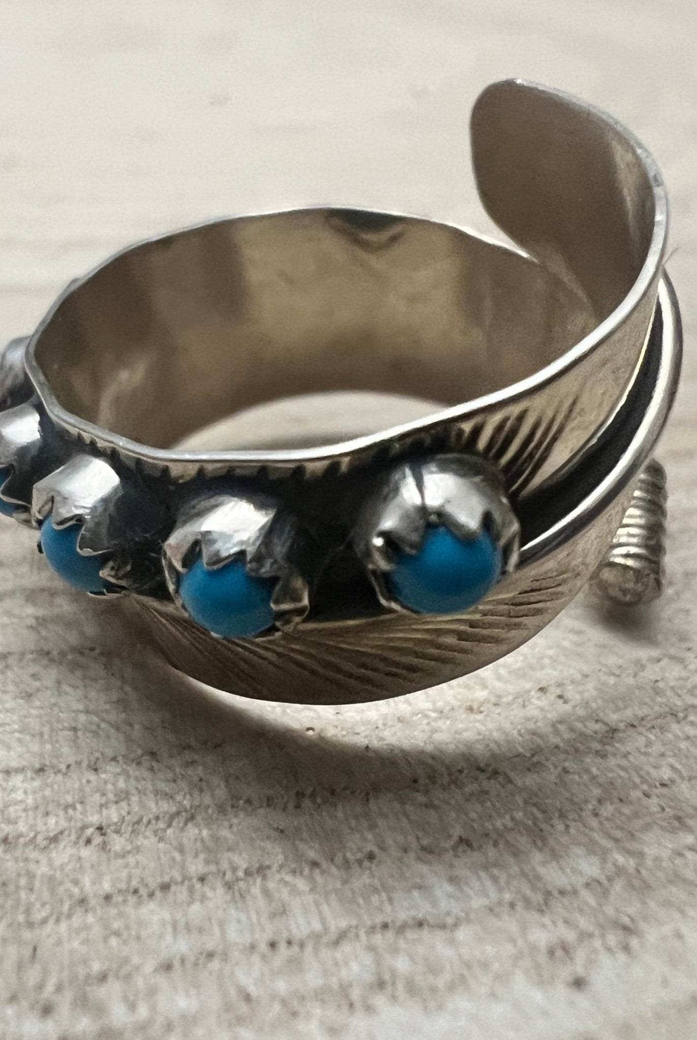 Chester Charley Navajo Handmade Kingman Turquoise Feather Adjustable Ring - Cowhide and Conchos