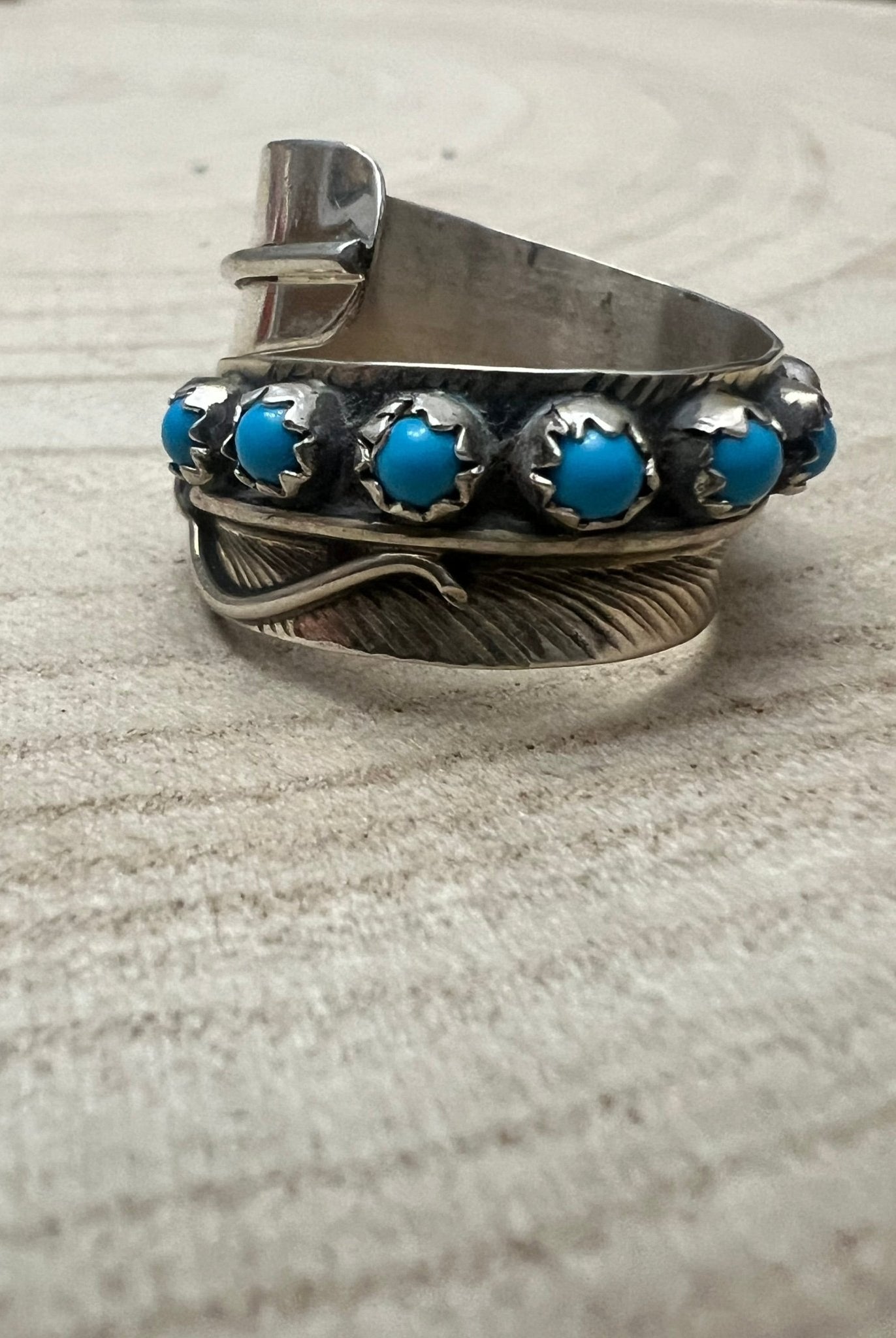 Chester Charley Navajo Handmade Kingman Turquoise Feather Adjustable Ring - Cowhide and Conchos