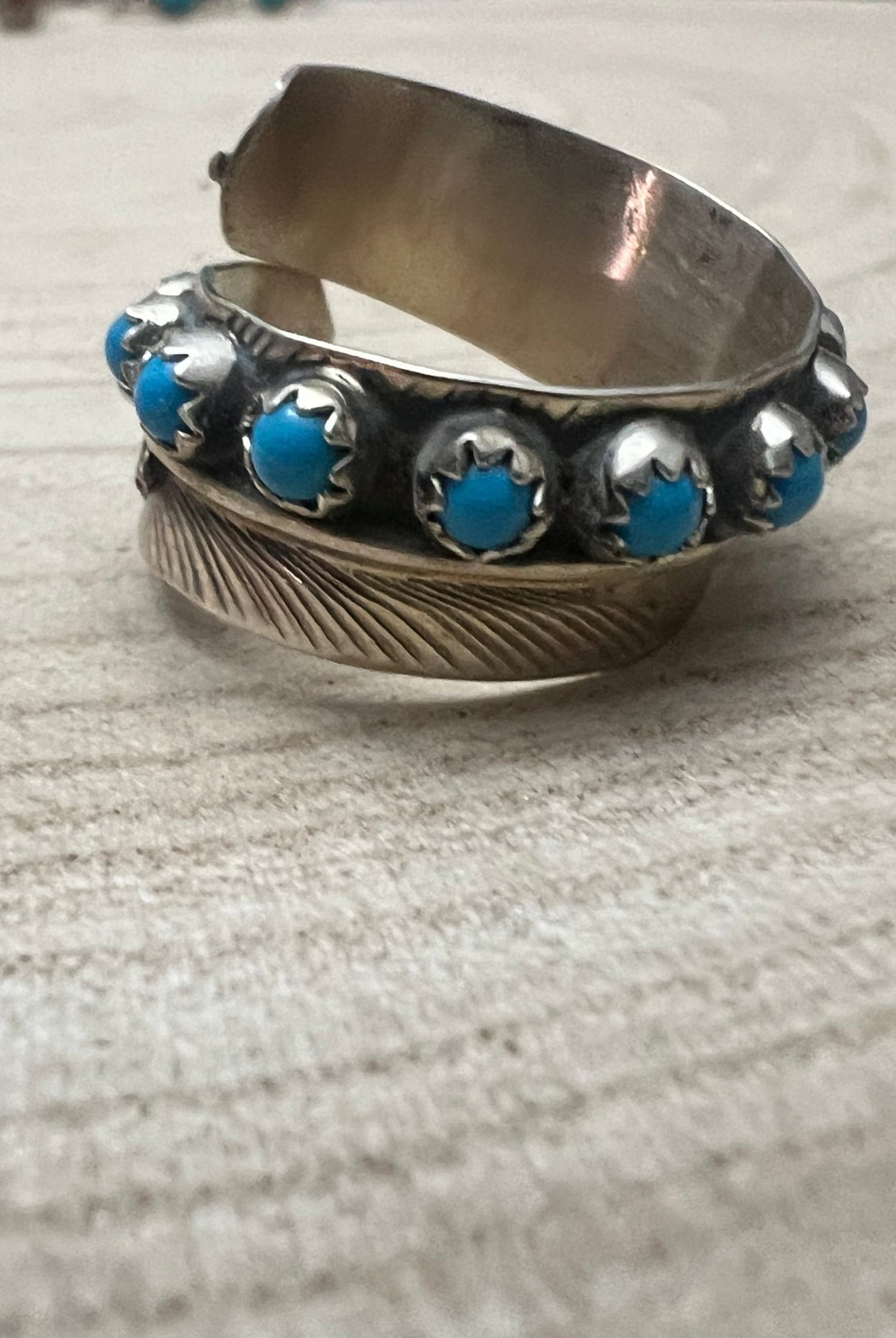Chester Charley Navajo Handmade Kingman Turquoise Feather Adjustable Ring - Cowhide and Conchos