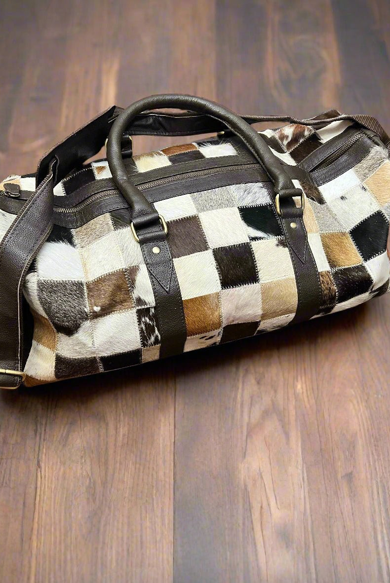 Cowhide Patch Duffle Bag - Cowhide and Conchos