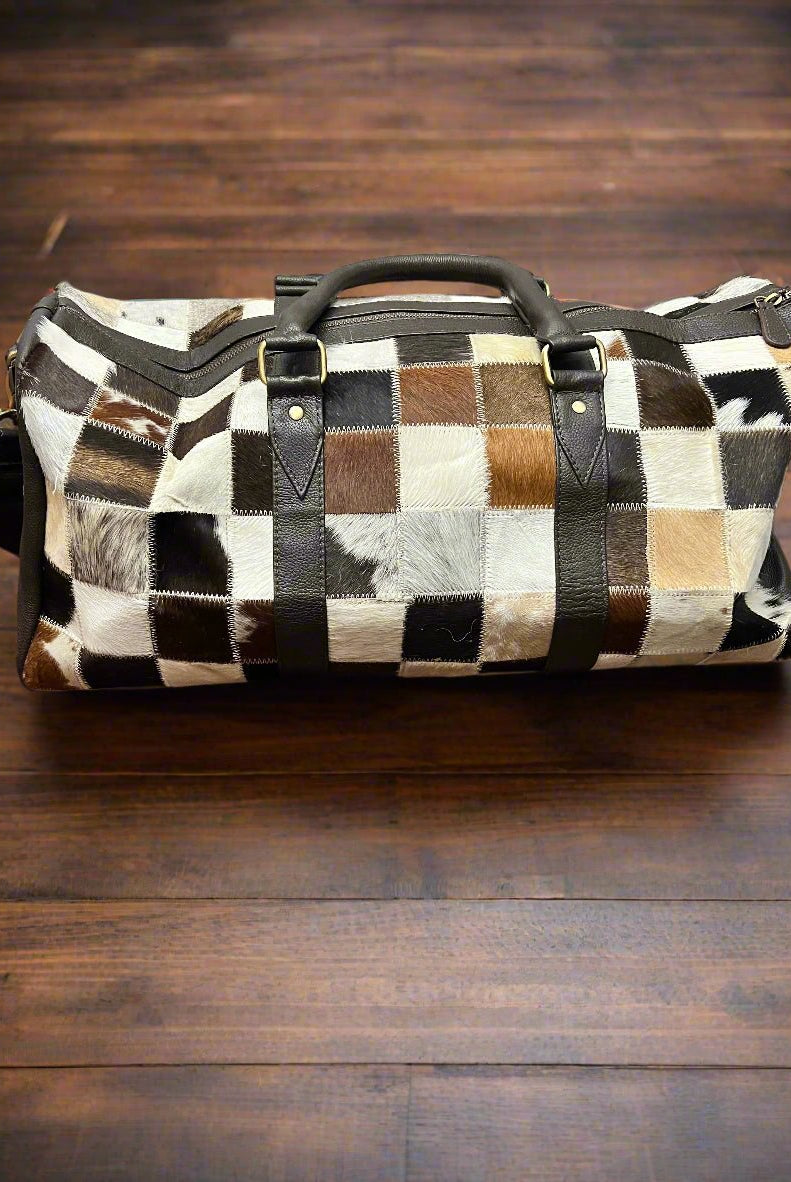 Cowhide Patch Duffle Bag - Cowhide and Conchos