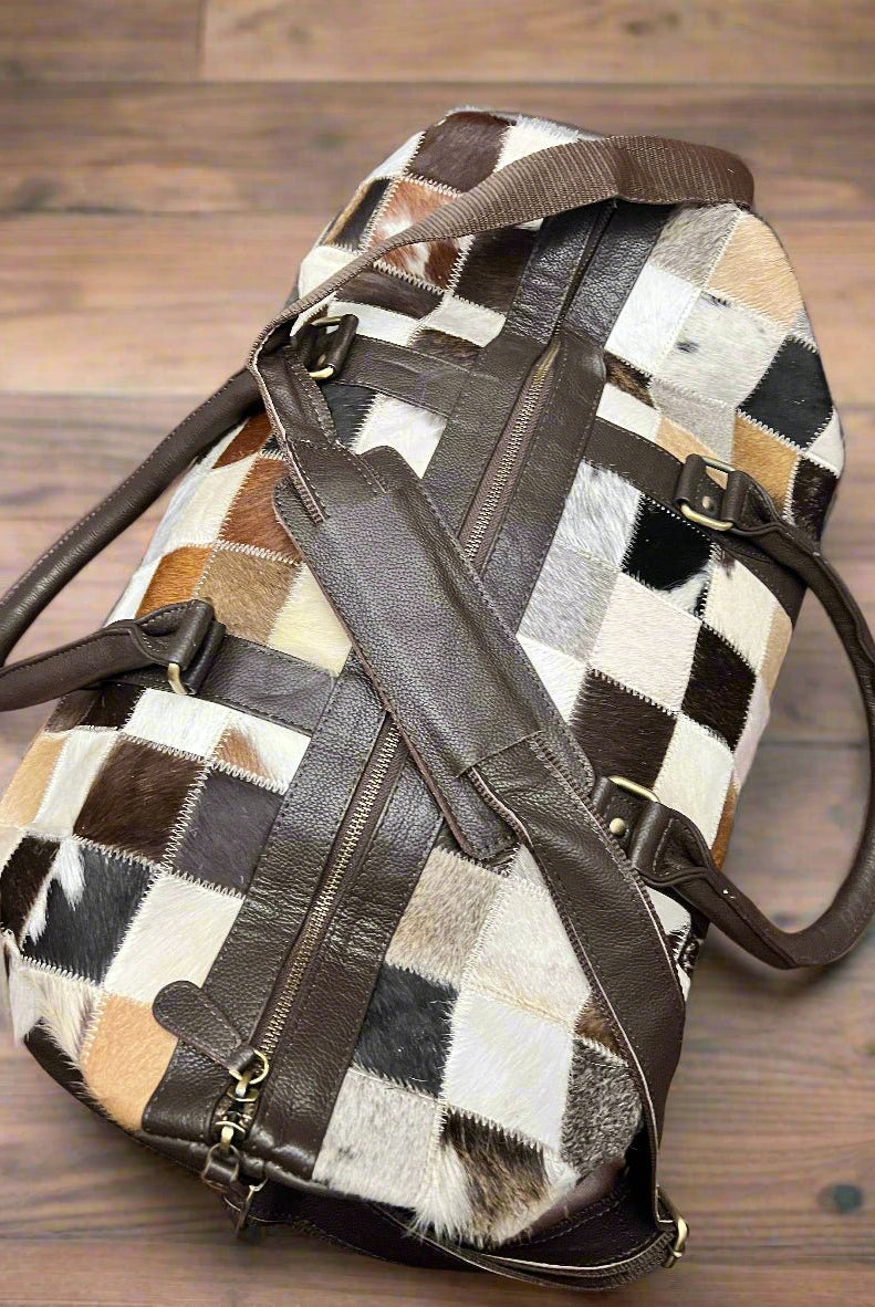 Cowhide Patch Duffle Bag - Cowhide and Conchos