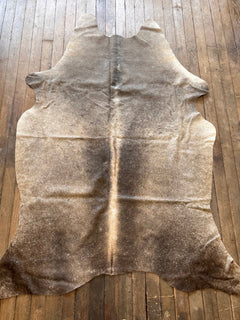 Cowhide Rug - 7' by 4.5' - Cowhide and Conchos