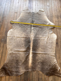 Cowhide Rug - 7' by 4.5' - Cowhide and Conchos