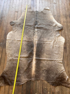 Cowhide Rug - 7' by 4.5' - Cowhide and Conchos