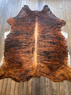 Cowhide Rug - 7' by 5' - Cowhide and Conchos