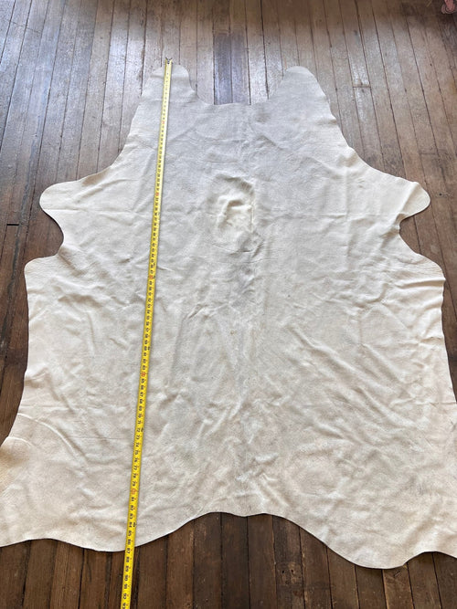 Cowhide Rug - 7' by 5' - Cowhide and Conchos