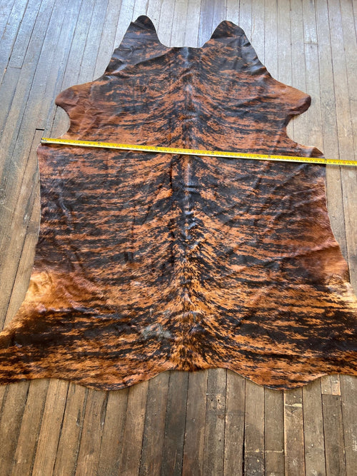 Cowhide Rug - 7' by 5' - Cowhide and Conchos
