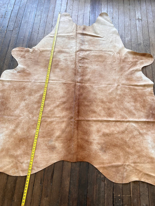 Cowhide Rug - 7' by 6' - Cowhide and Conchos