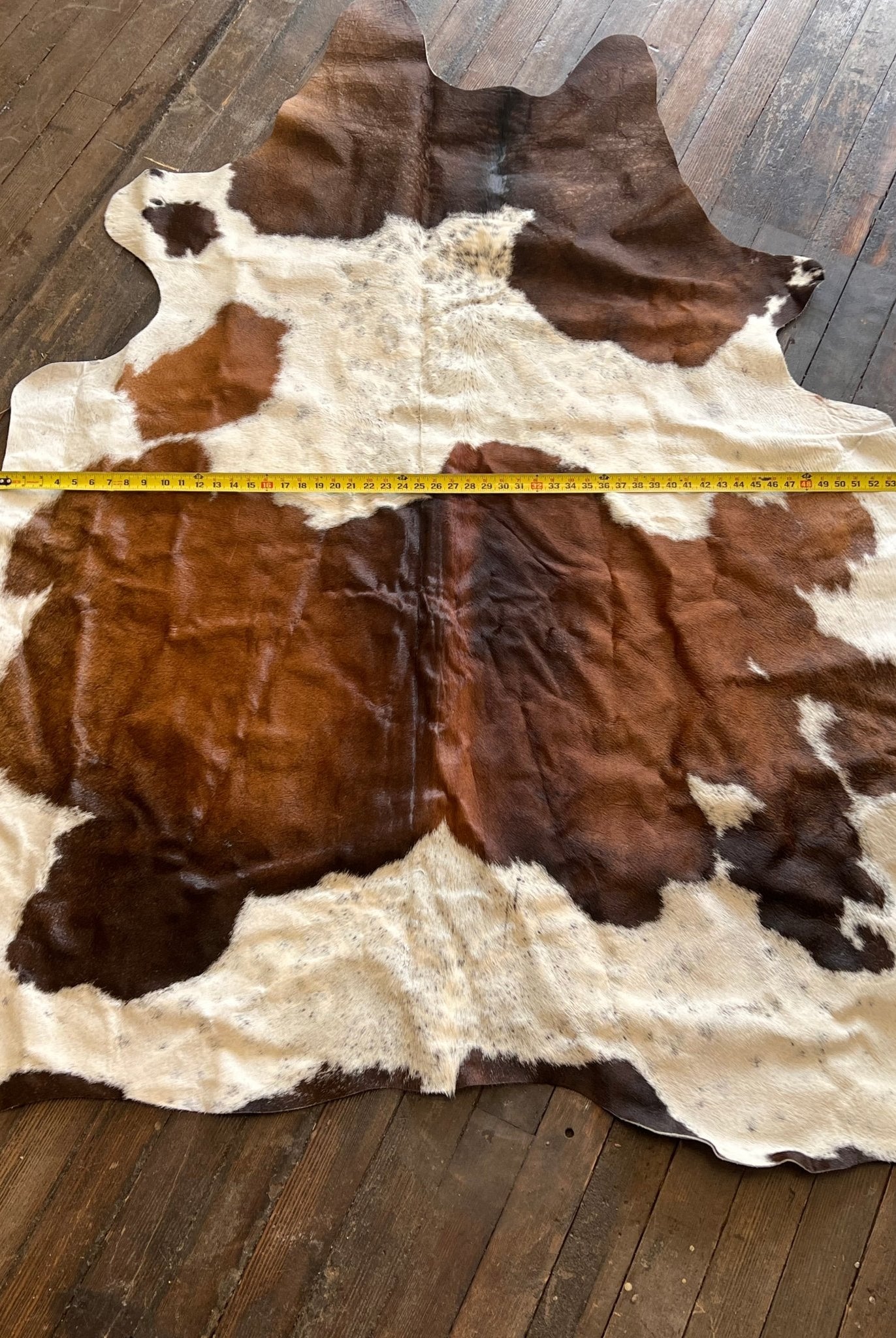 Cowhide Rug1 - 6.5 ft by 4.5 ft. - Cowhide and Conchos
