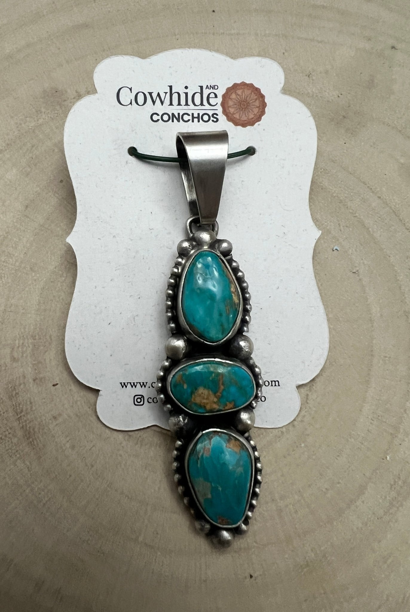 Darrin Livingston Navajo Sterling Silver Pendant with Natural Royston Turquoise — 3" × 3/4" (Hallmark) - Cowhide and Conchos
