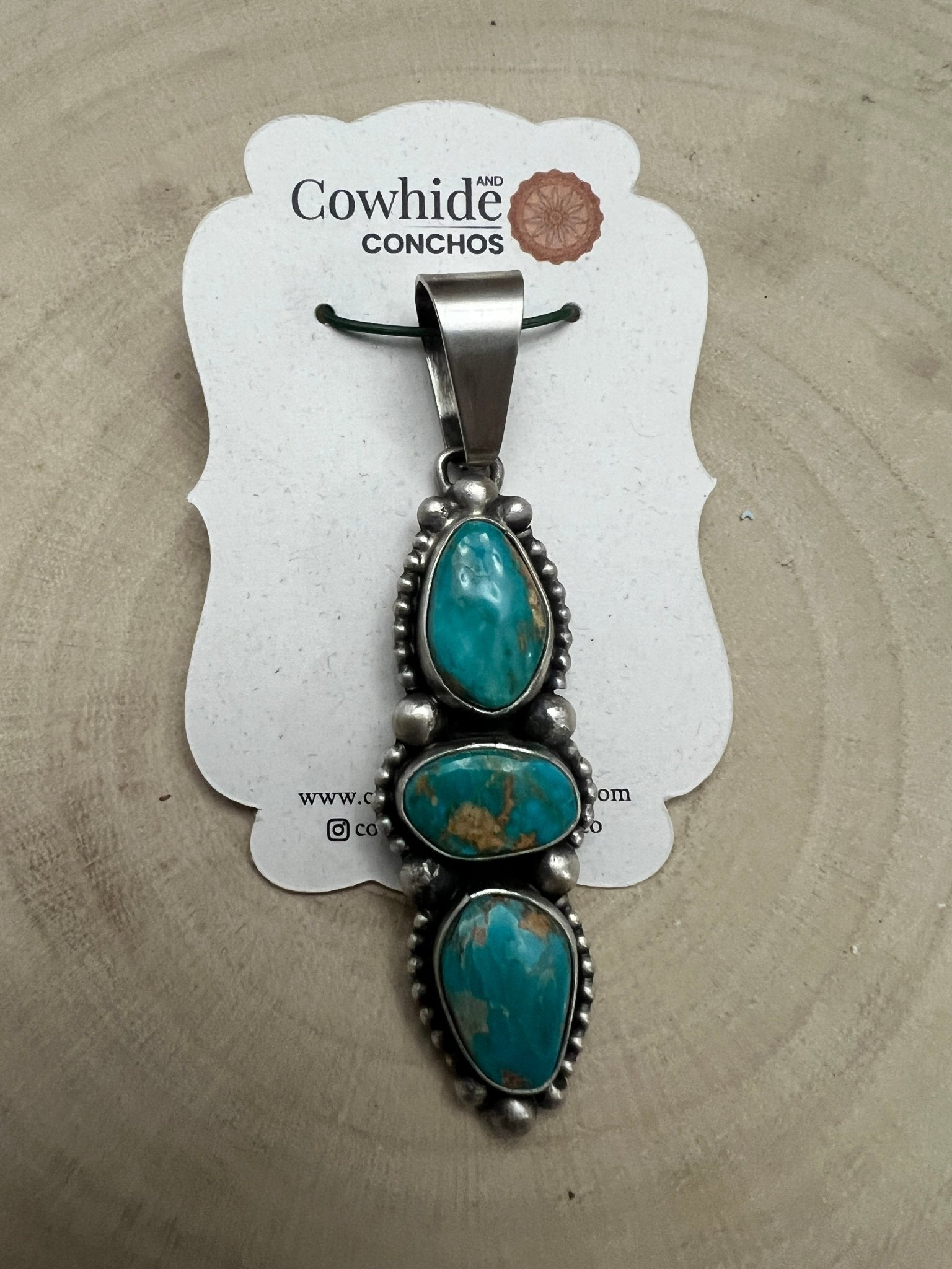 Darrin Livingston Navajo Sterling Silver Pendant with Natural Royston Turquoise — 3" × 3/4" (Hallmark) - Cowhide and Conchos