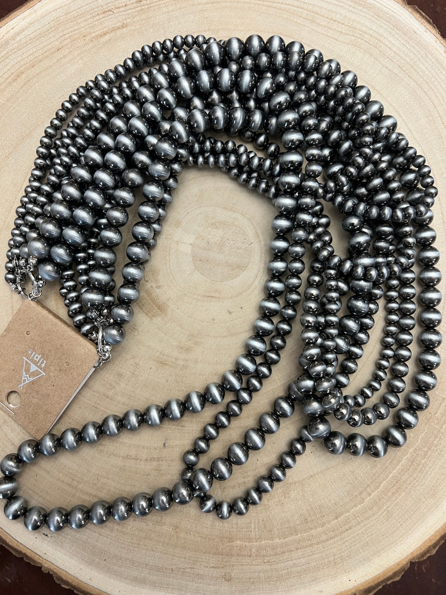 Eight Row Faux Sterling Pearl Layered Necklace Set - Cowhide and Conchos