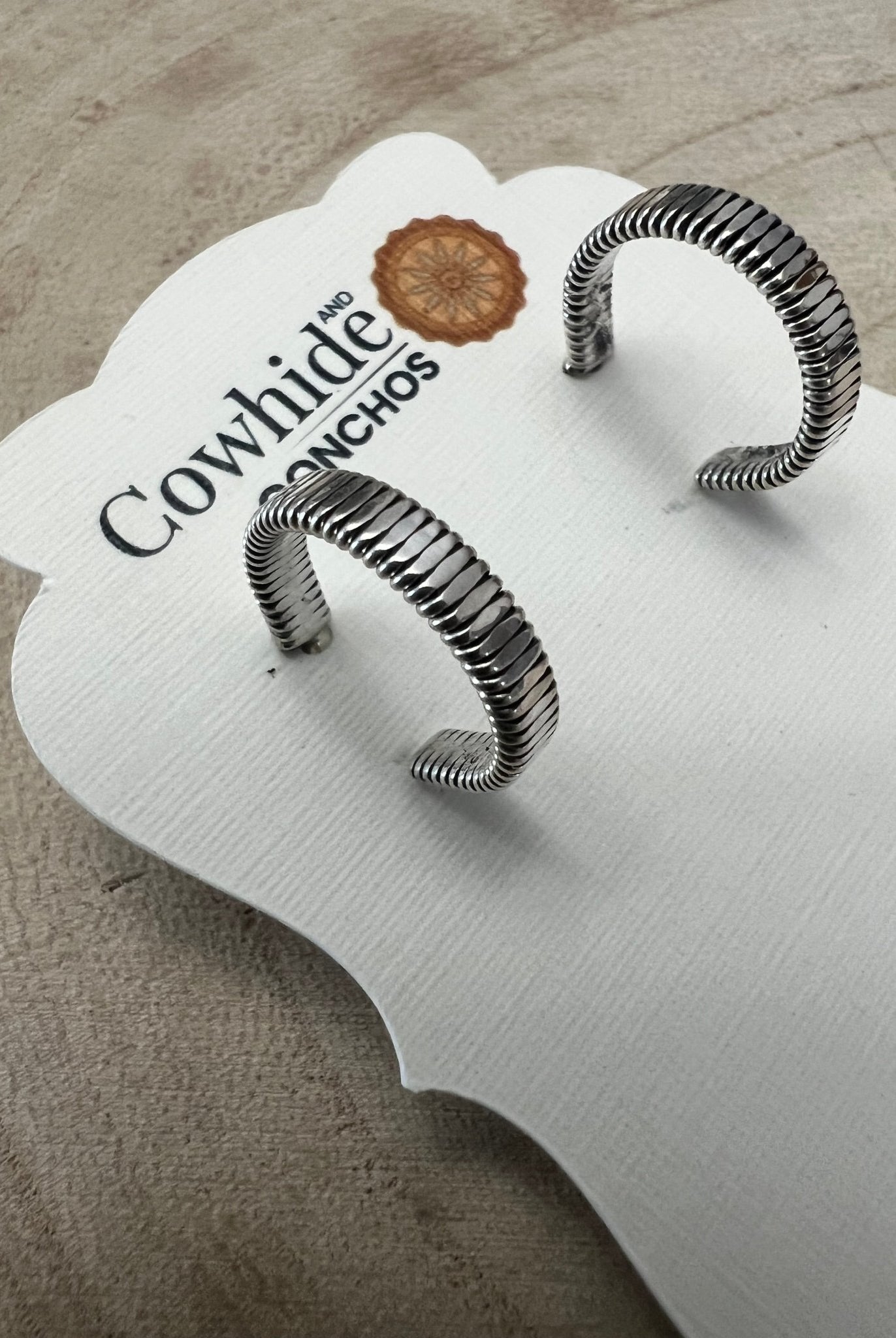 Elaine Tahe Sterling Silver Hoop Earrings - Cowhide and Conchos