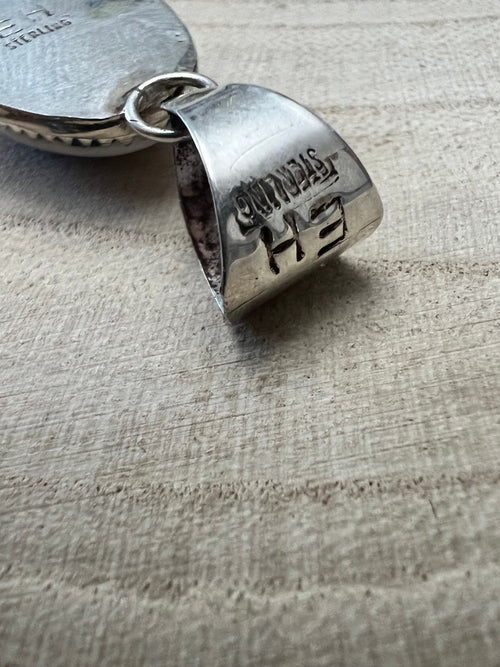 Ernest Hawthorne White Buffalo & Sterling Silver Pendant - Cowhide and Conchos