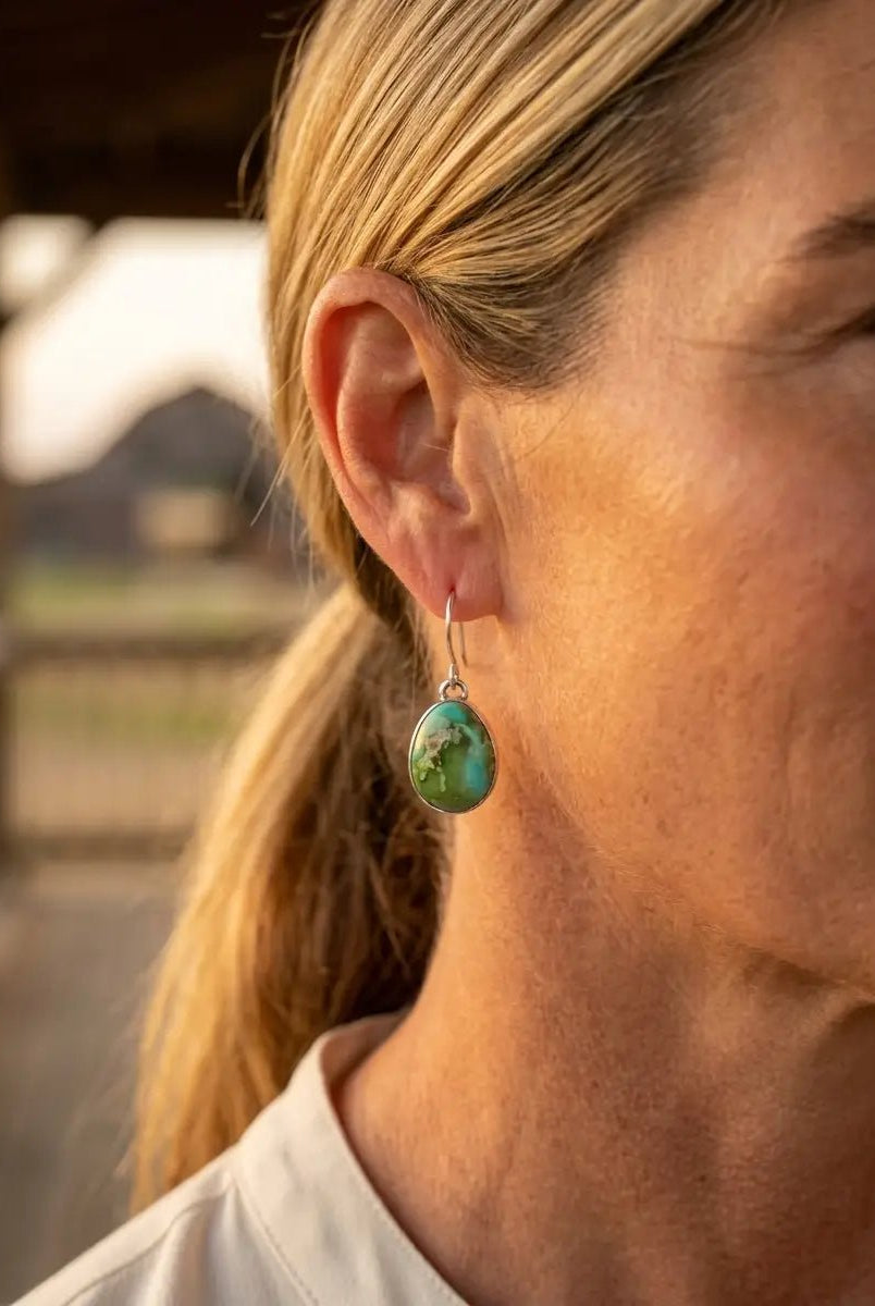 Eugene Gruber Sonoran Turquoise Earrings — 1 1/4" × 3/8" - Cowhide and Conchos