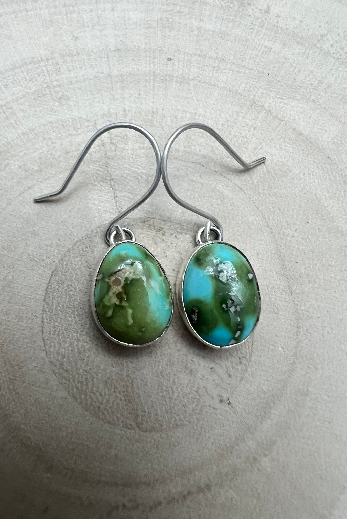 Eugene Gruber Sonoran Turquoise Earrings — 1 1/4" × 3/8" - Cowhide and Conchos