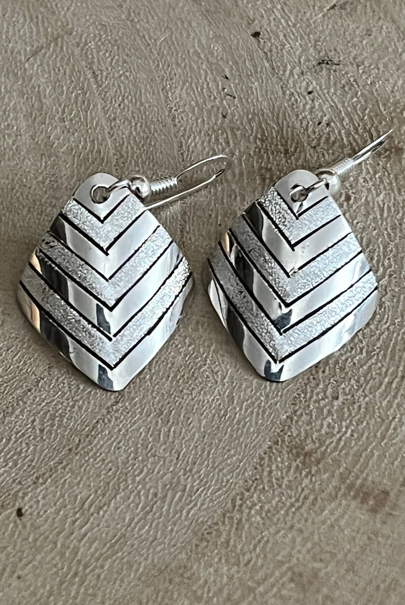 Florence Tahe Navajo Handmade Sterling silver Earrings - Cowhide and Conchos