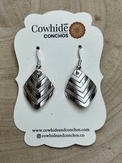 Florence Tahe Navajo Handmade Sterling silver Earrings - Cowhide and Conchos