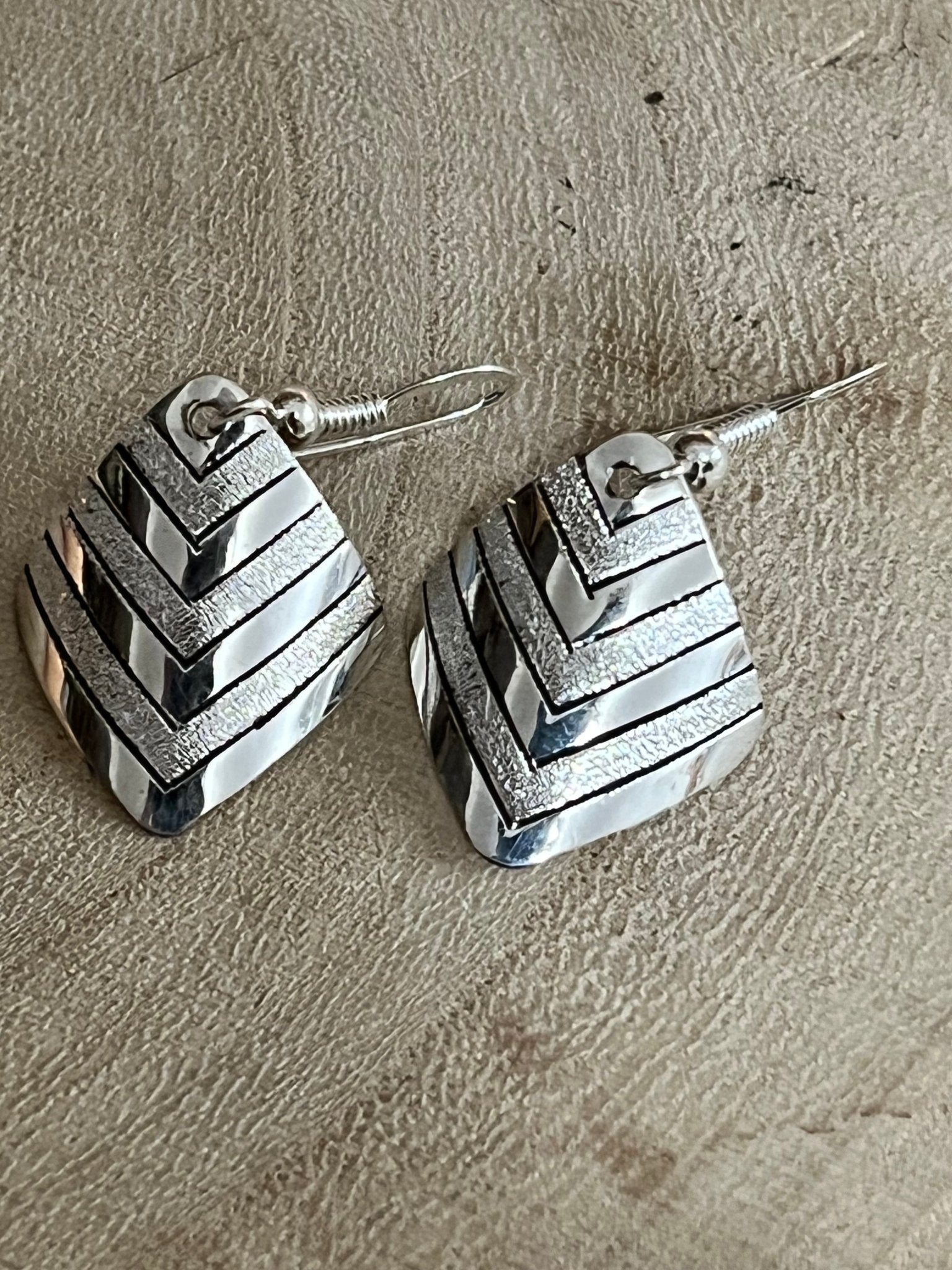 Florence Tahe Navajo Handmade Sterling silver Earrings - Cowhide and Conchos