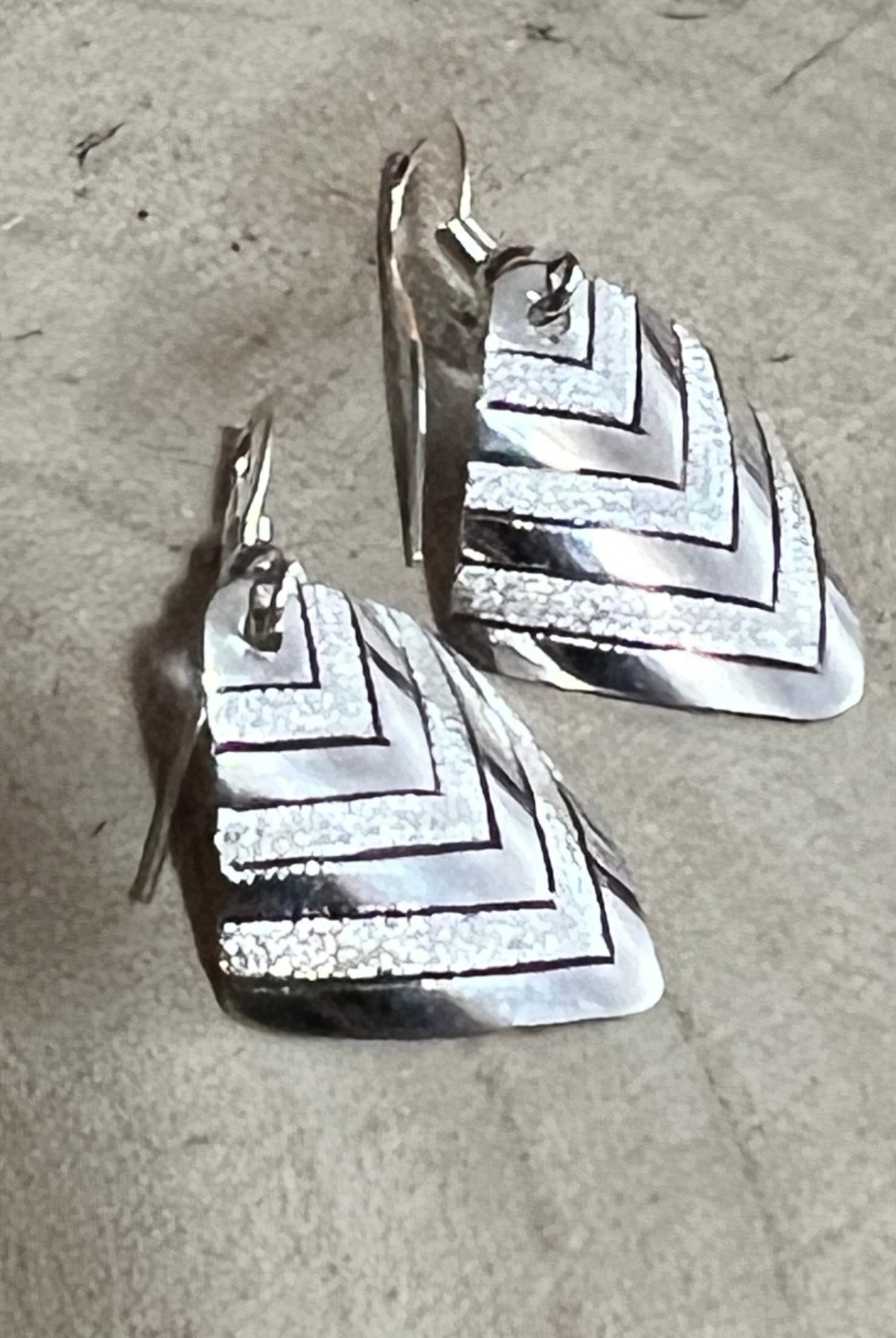 Florence Tahe Navajo Handmade Sterling silver Earrings - Cowhide and Conchos