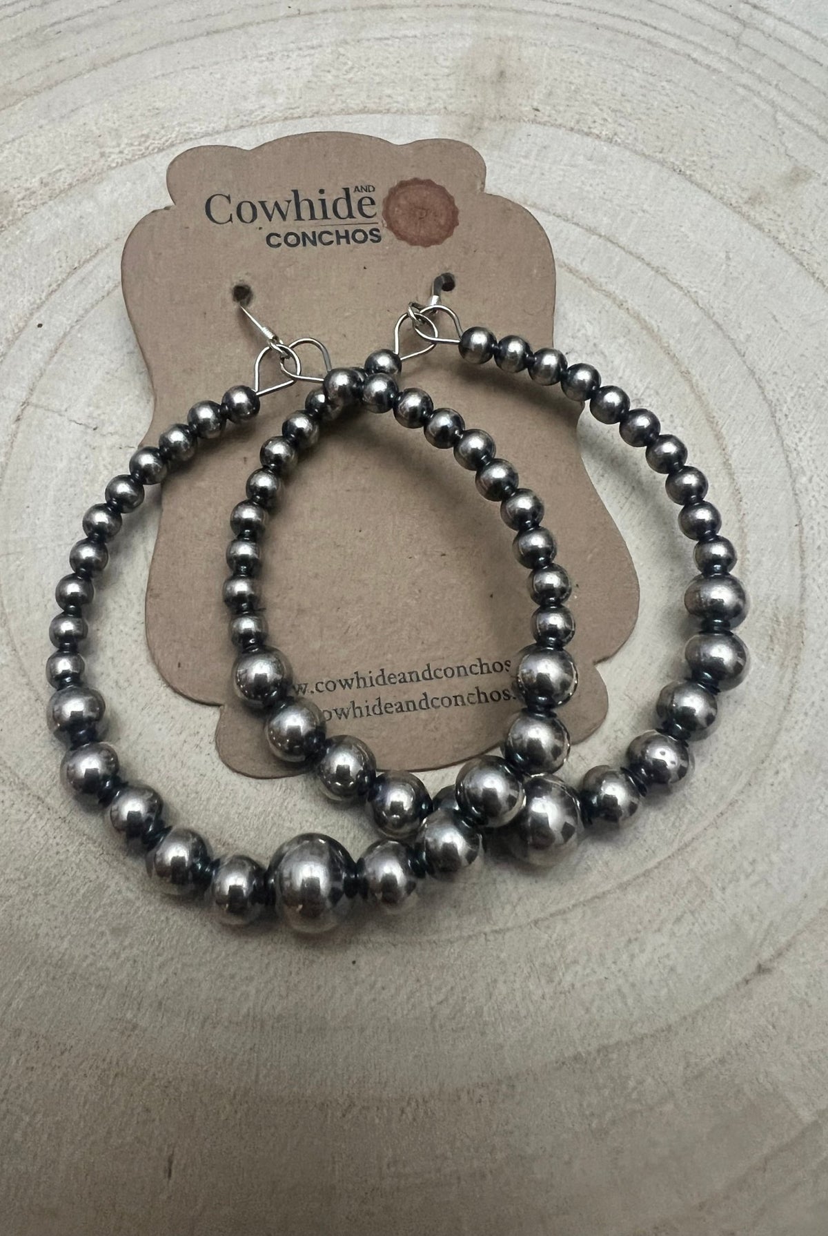 Graduated Sterling Silver Pearl Hoops - Cowhide and Conchos