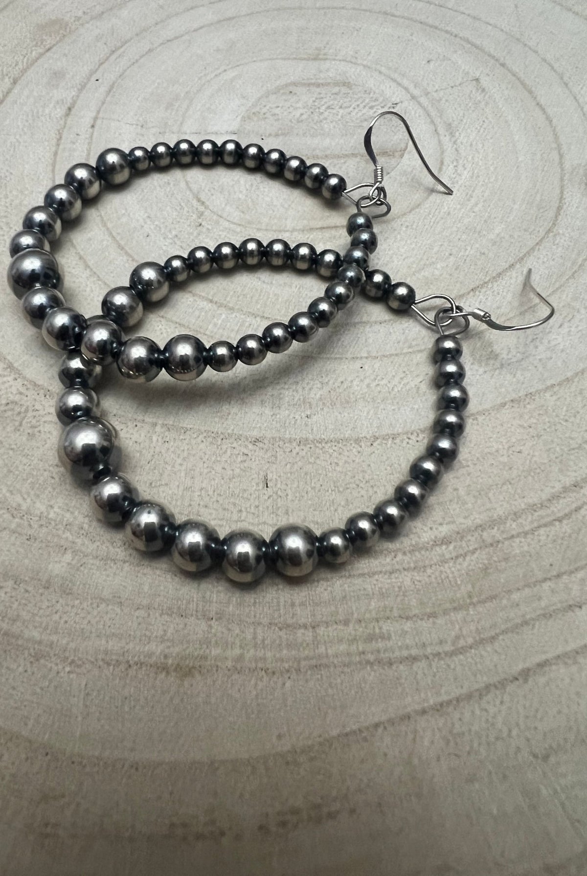 Graduated Sterling Silver Pearl Hoops - Cowhide and Conchos