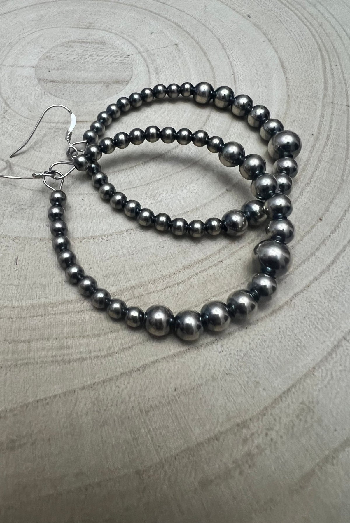 Graduated Sterling Silver Pearl Hoops - Cowhide and Conchos