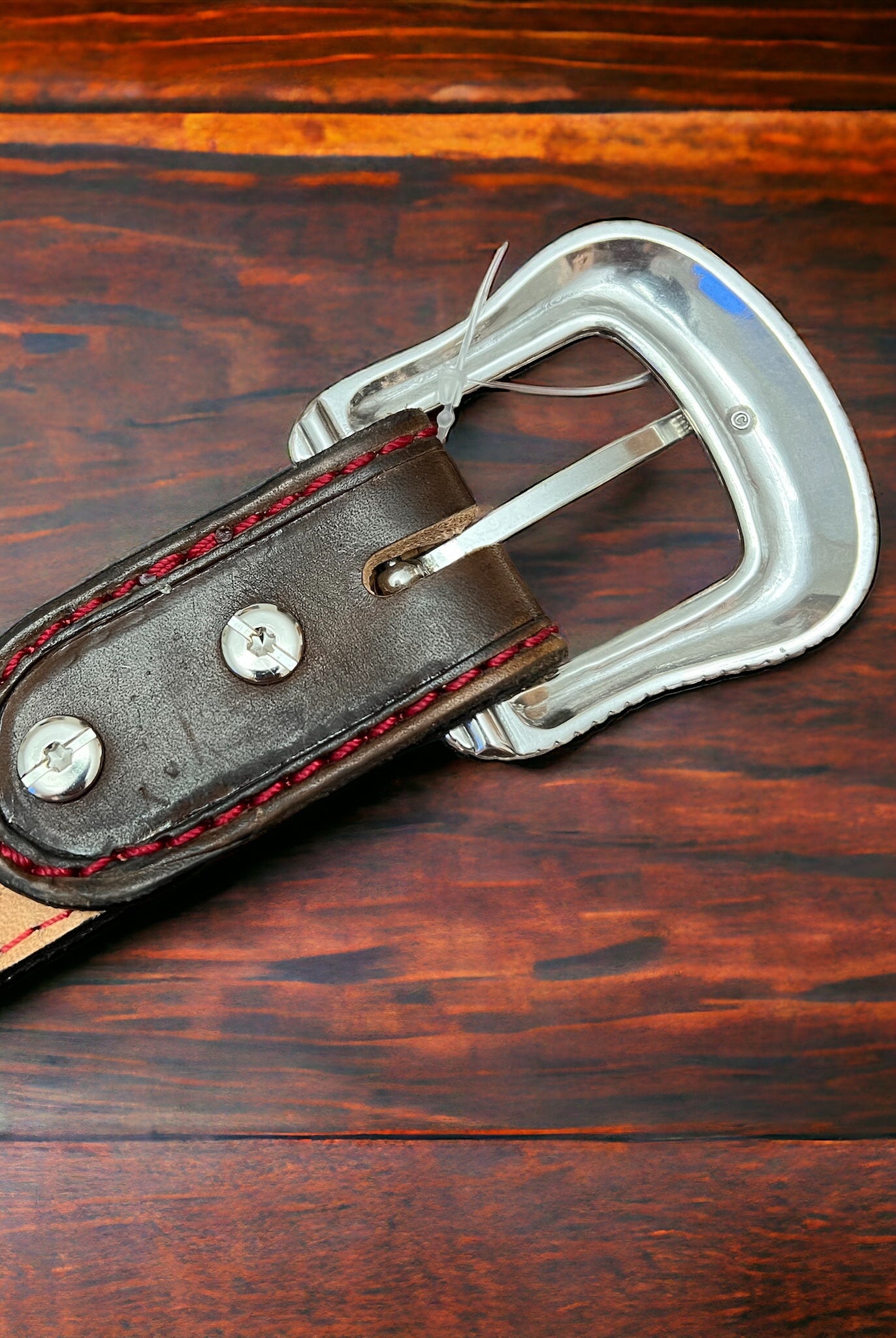 Hand Tooled Leather Belt - Will fit a 32 - 36 inch waist. - Cowhide and Conchos