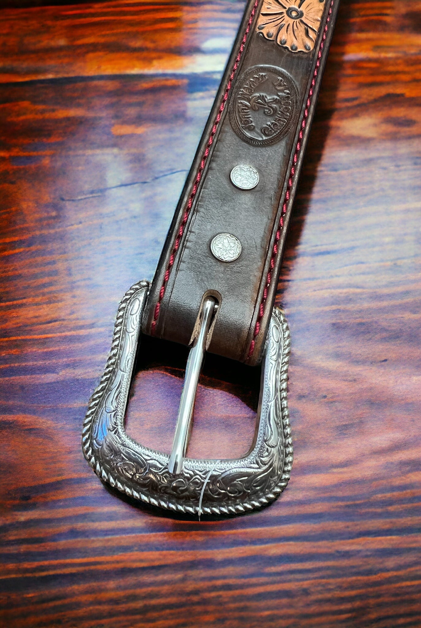 Hand Tooled Leather Belt - Will fit a 32 - 36 inch waist. - Cowhide and Conchos