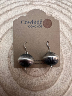 Handmade and stamped Navajo Pearl Earrings by Preston Haley - Cowhide and Conchos