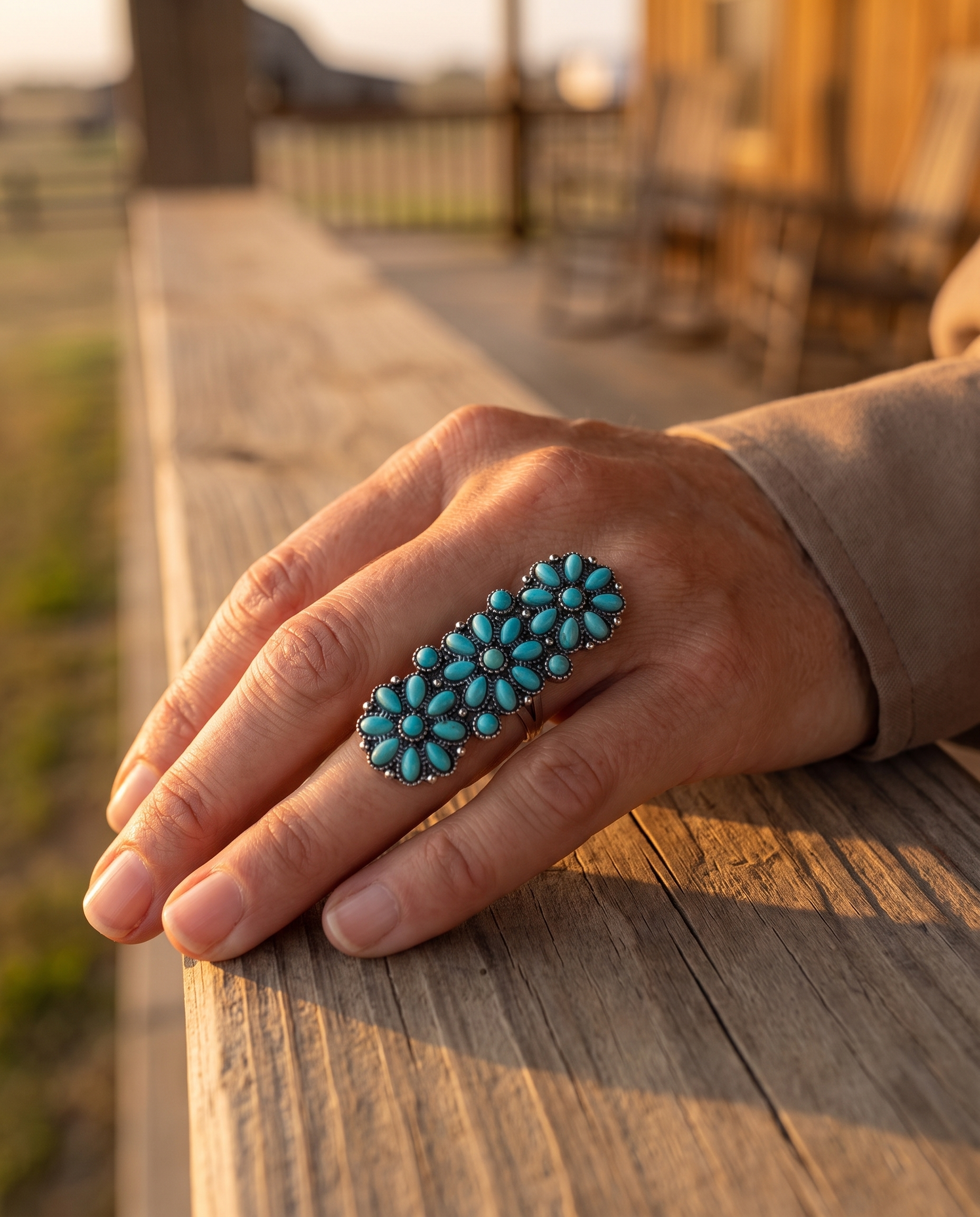 Close-up of the Cowhide & Conchos Western Desert Bloom faux-turquoise cluster ring — up close.