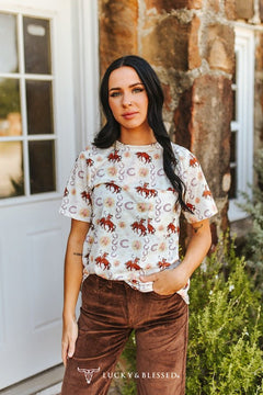 Ivory Cowboy & Horseshoe Printed Short Sleeve Front Pocket Tee - Cowhide and Conchos