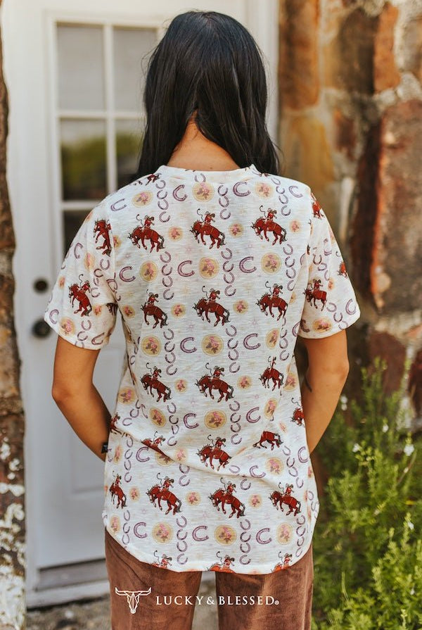 Ivory Cowboy & Horseshoe Printed Short Sleeve Front Pocket Tee - Cowhide and Conchos