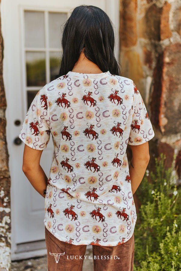 Ivory Cowboy & Horseshoe Printed Short Sleeve Front Pocket Tee - Cowhide and Conchos